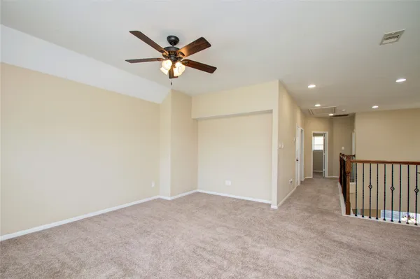 a view of a livingroom with a ceiling fan