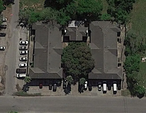 a white bath tub sitting next to a white toilet