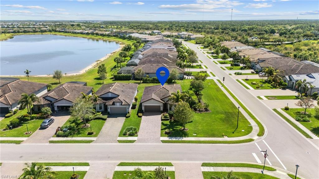 19953 Beverly Park Road Estero, FL 33928 - Photo 30 of 50 Aerial view featuring a residential view and a water view