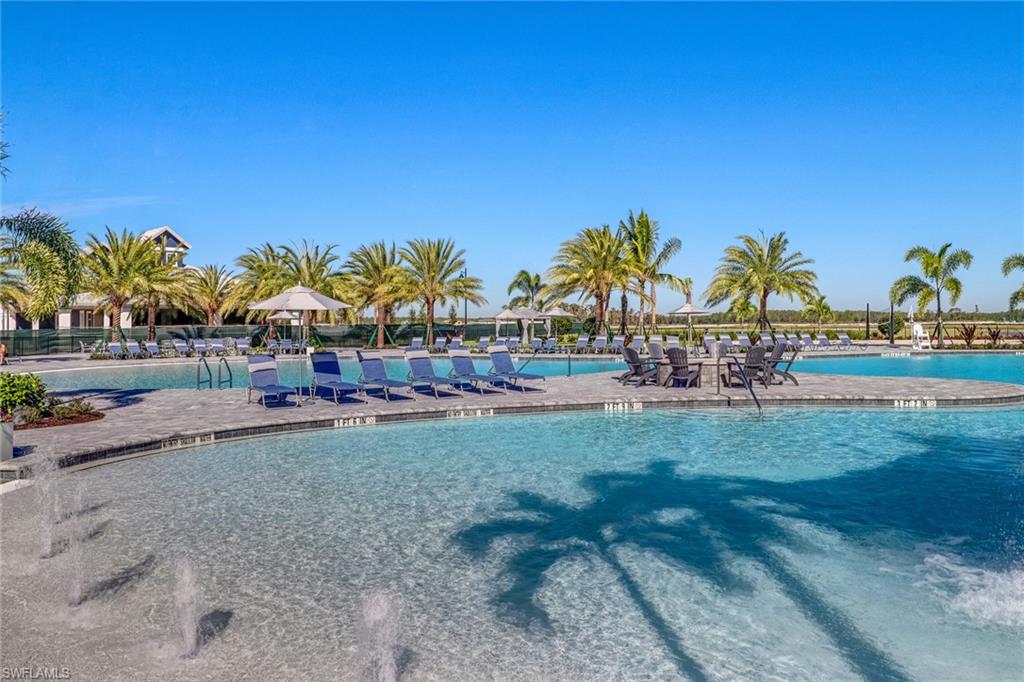19953 Beverly Park Road Estero, FL 33928 - Photo 46 of 50 Community pool featuring a patio