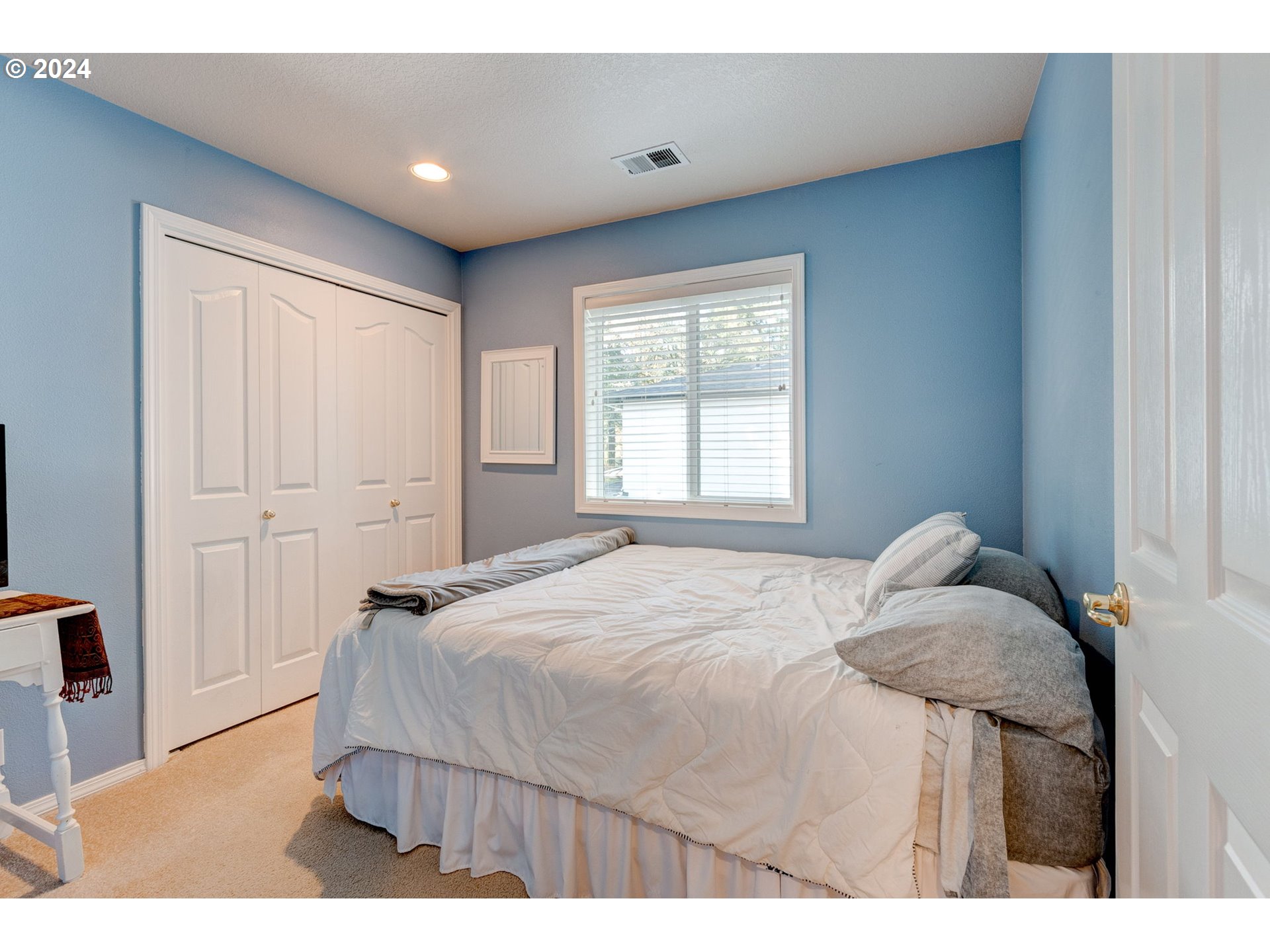 17558 Bryant Road Lake Oswego, OR 97035 - Photo 31 of 48 a bedroom with a bed and a window