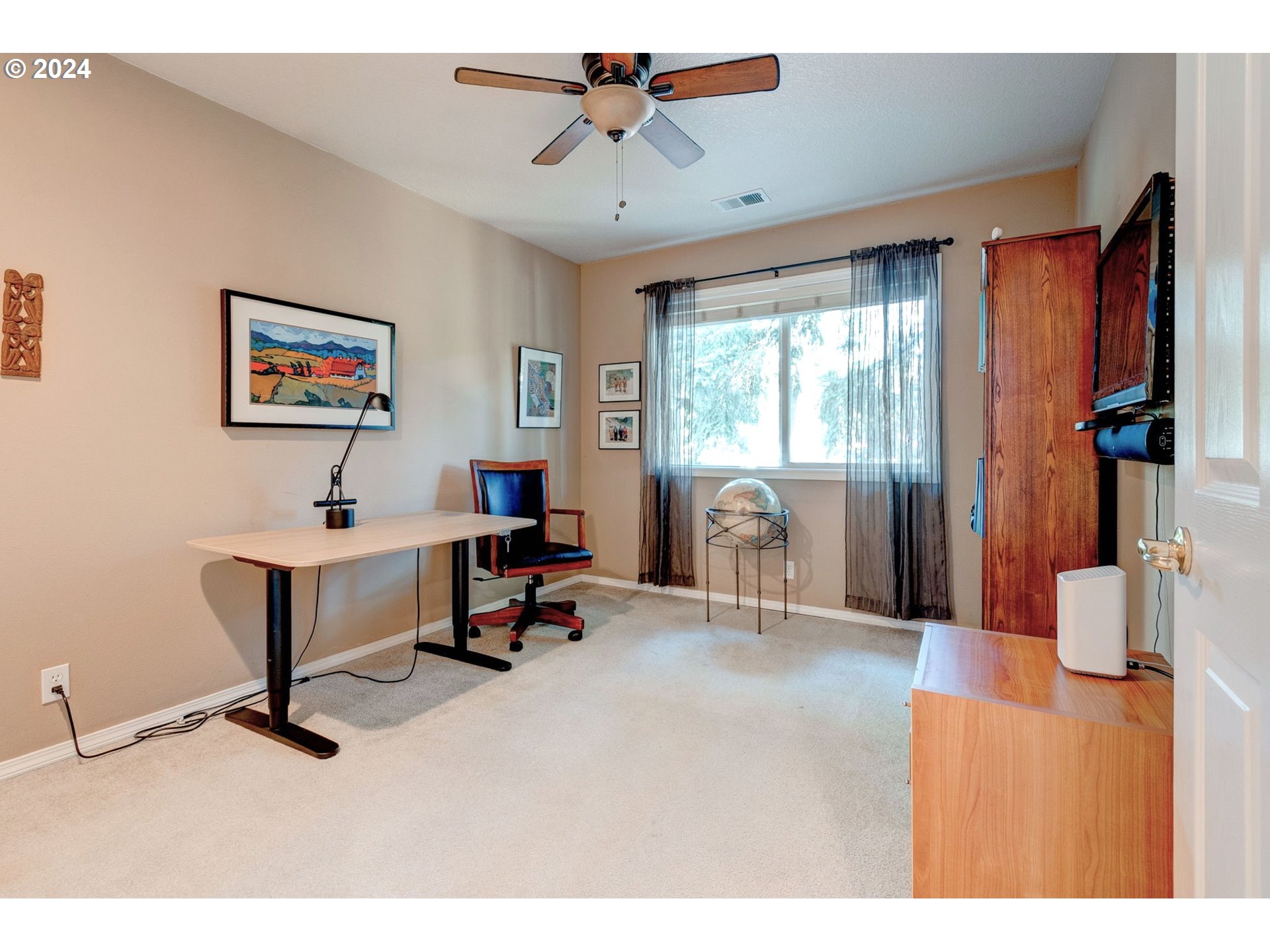 17558 Bryant Road Lake Oswego, OR 97035 - Photo 32 of 48 a view of a livingroom with workspace and a window