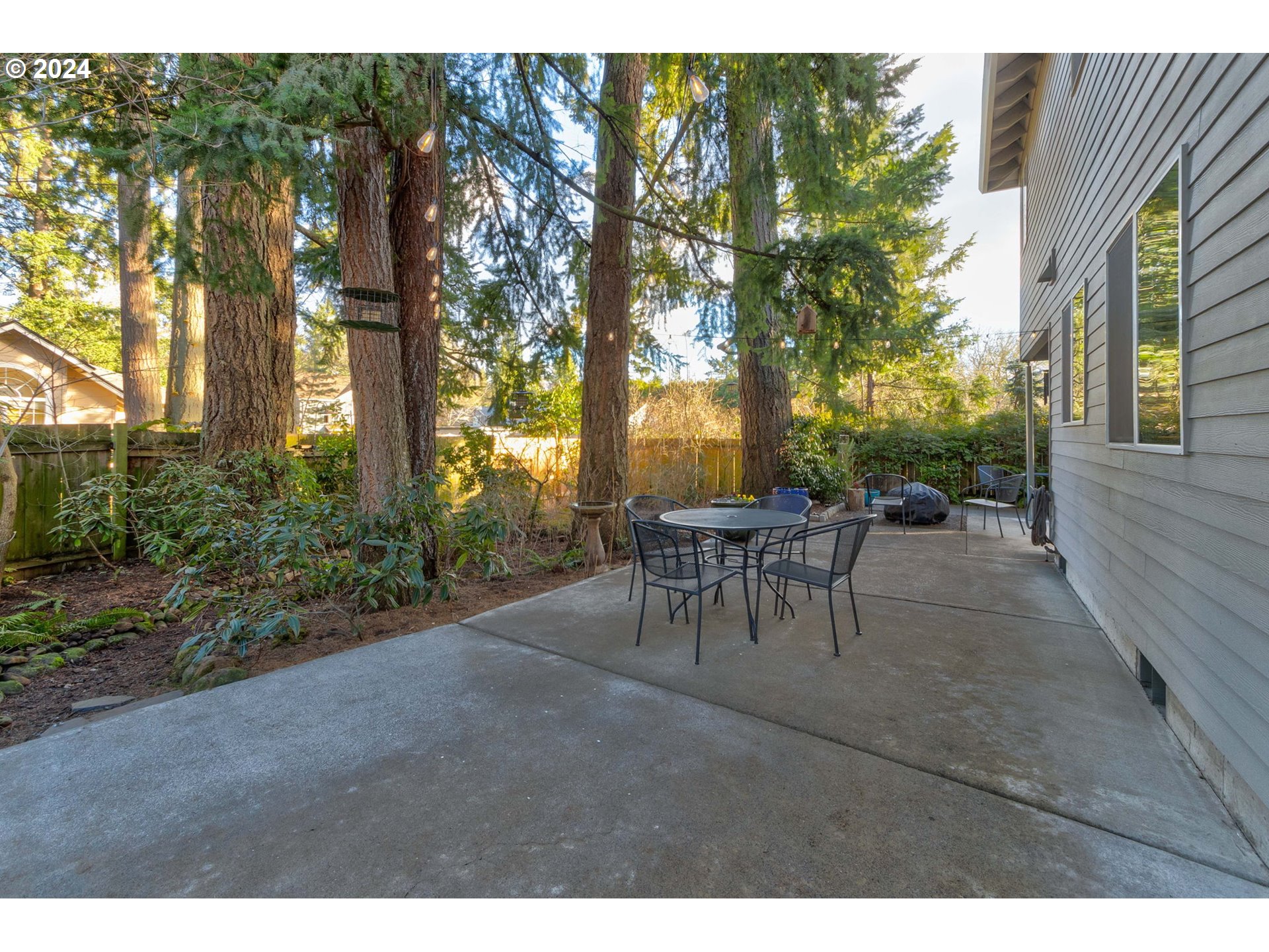 17558 Bryant Road Lake Oswego, OR 97035 - Photo 42 of 48 a view of a tables and chairs in the patio