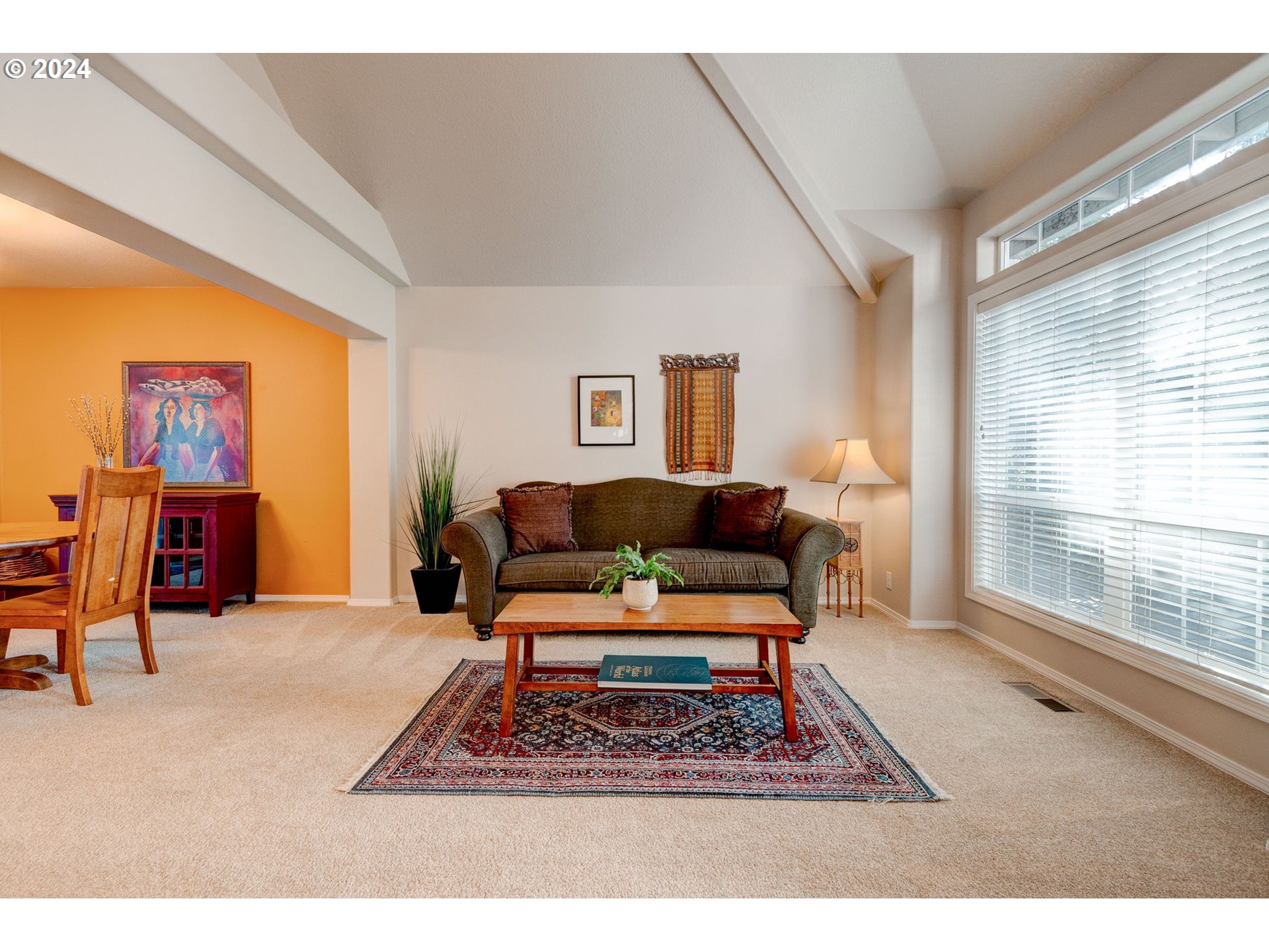 17558 Bryant Road Lake Oswego, OR 97035 - Photo 6 of 48 a living room with furniture a rug potted plant and a large window