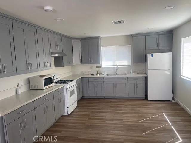 a bathroom with a shower and toilet