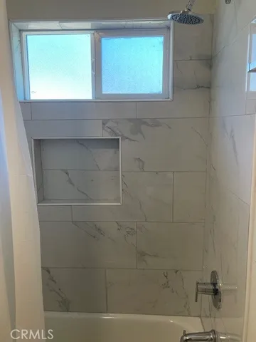 a bathroom with a bathtub