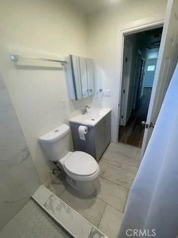 a view of backyard with cabin