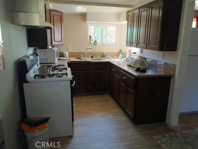 a front view of a house with yard