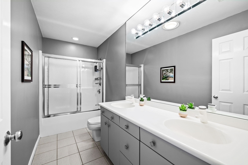 6 Yolande Road Marblehead, MA 01945 - Photo 21 of 29 a bathroom with a sink a toilet and shower