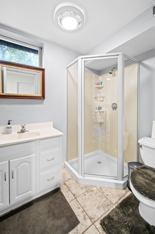 6 Yolande Road Marblehead, MA 01945 - Photo 24 of 29 a bathroom with a sink a toilet and shower