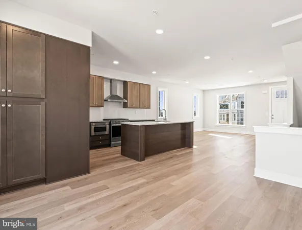 a view of kitchen with wooden floor