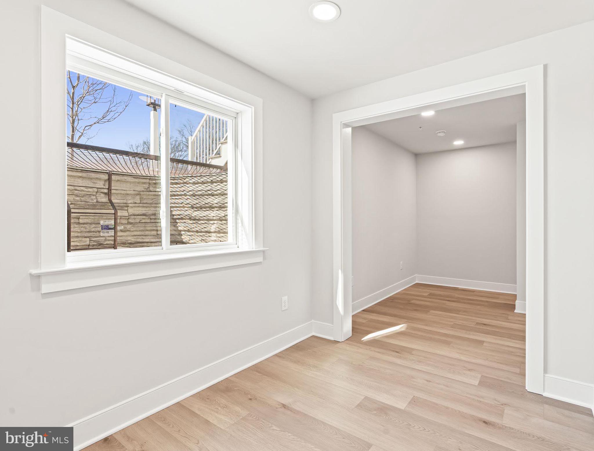 4129 Ridgeview Avenue Mechanicsburg, PA 17055 - Photo 20 of 59 an empty room with wooden floor and windows