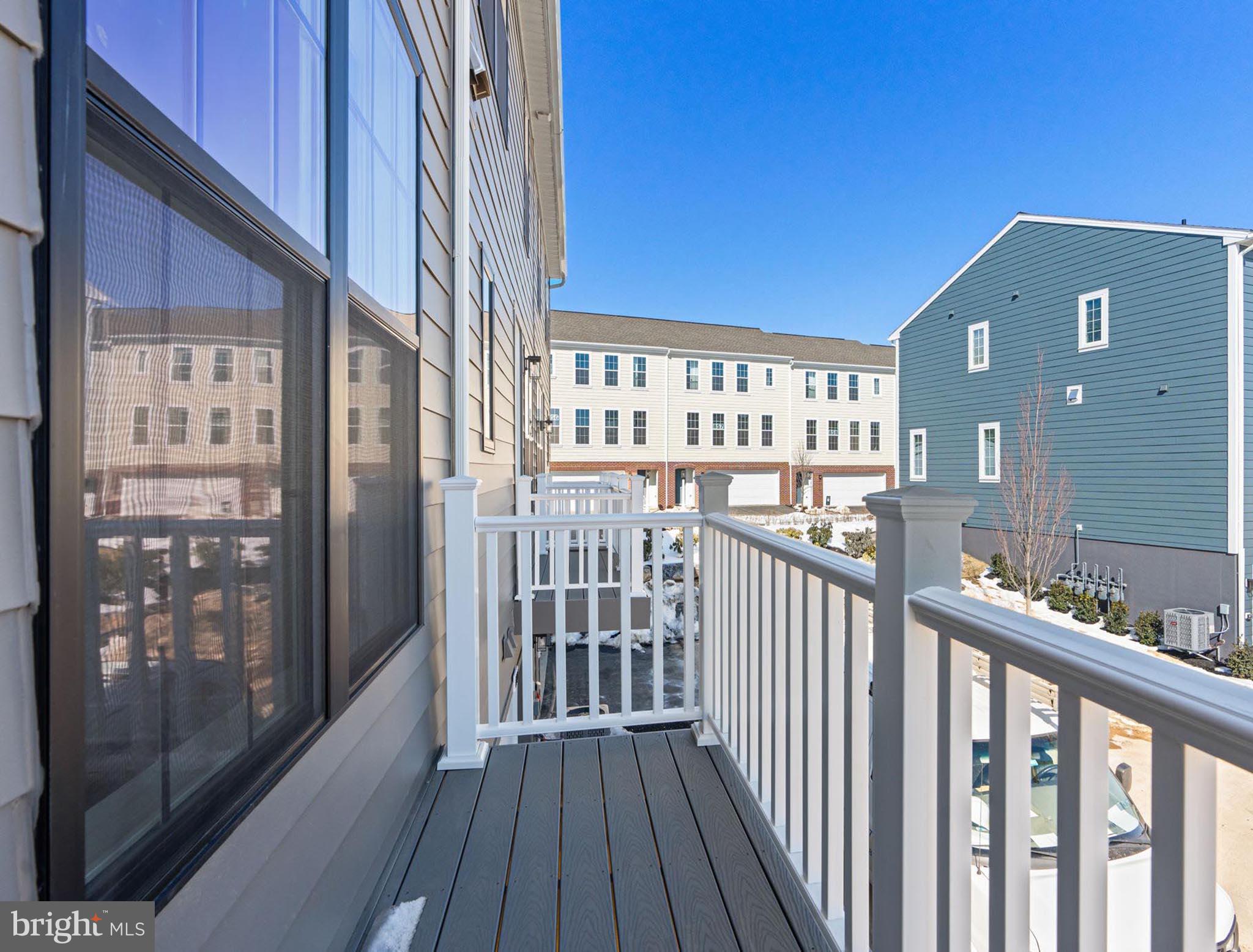 4129 Ridgeview Avenue Mechanicsburg, PA 17055 - Photo 3 of 59 a view of a balcony with wooden floor
