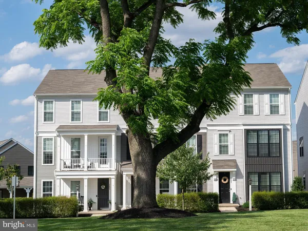 a view of a house with a big yard
