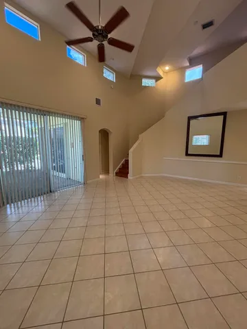 a view of a livingroom with a staircase