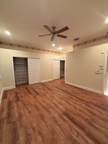 a view of a livingroom with a staircase