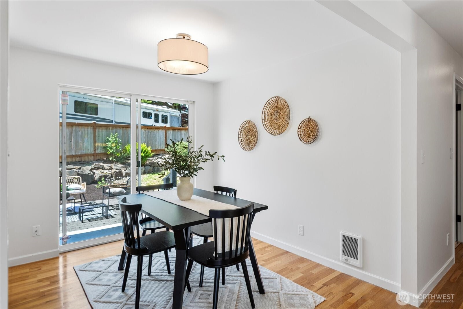23908 80th Place West Edmonds, WA 98026 - Photo 12 of 40 a view of a dining room with furniture and wooden floor