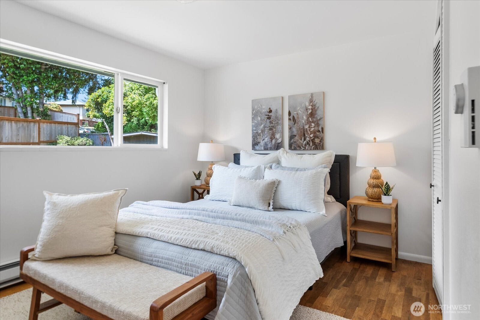 23908 80th Place West Edmonds, WA 98026 - Photo 13 of 40 a bedroom with a bed and a window