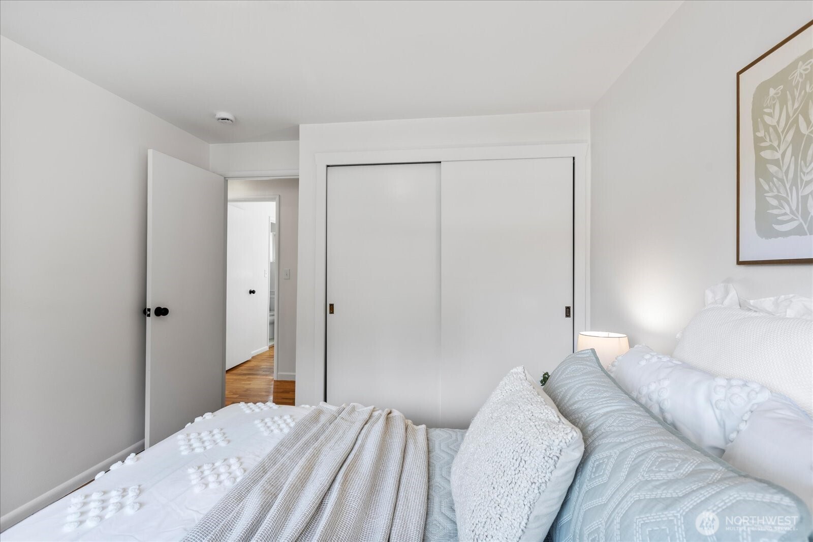 23908 80th Place West Edmonds, WA 98026 - Photo 18 of 40 a bedroom with a bed and a window