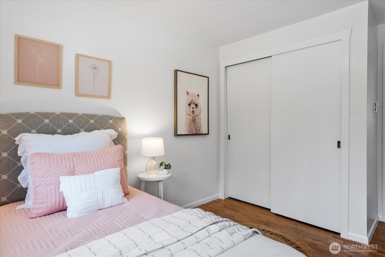 23908 80th Place West Edmonds, WA 98026 - Photo 20 of 40 a bedroom with a bed and painting on the wall