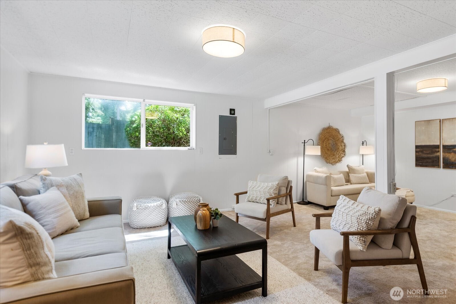 23908 80th Place West Edmonds, WA 98026 - Photo 22 of 40 a living room with furniture and a lamp
