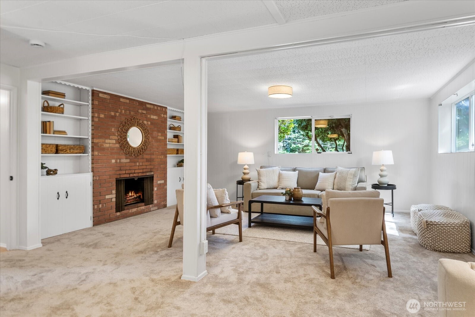 23908 80th Place West Edmonds, WA 98026 - Photo 25 of 40 a living room with furniture and a fireplace