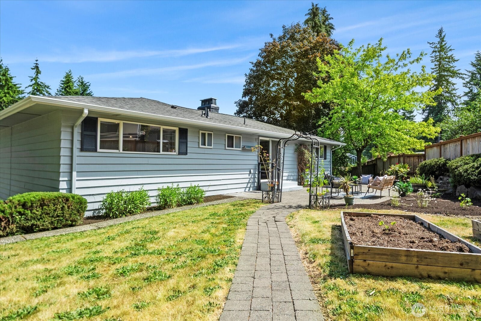23908 80th Place West Edmonds, WA 98026 - Photo 34 of 40 a front view of a house with garden