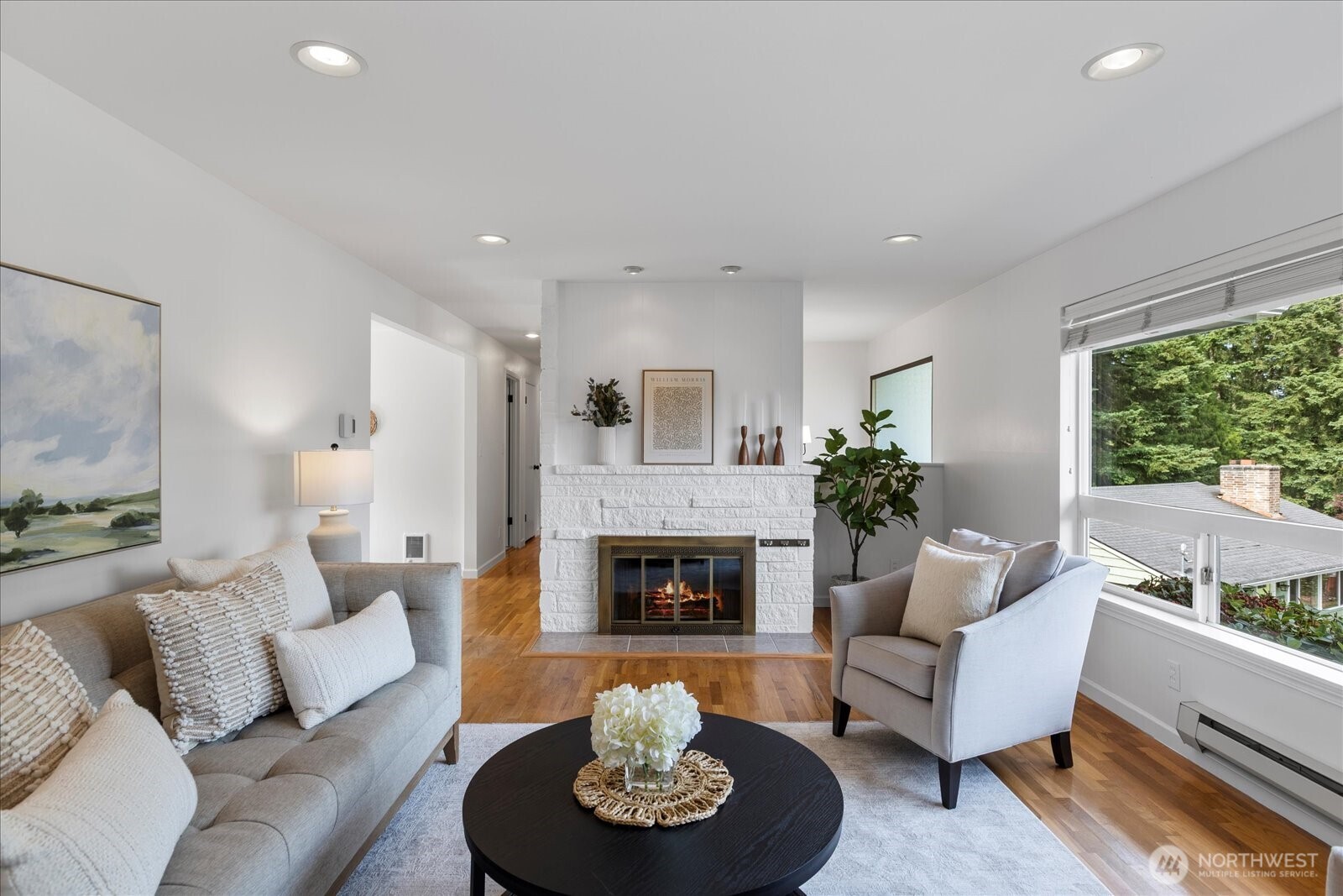 23908 80th Place West Edmonds, WA 98026 - Photo 5 of 40 a living room with furniture and a fireplace