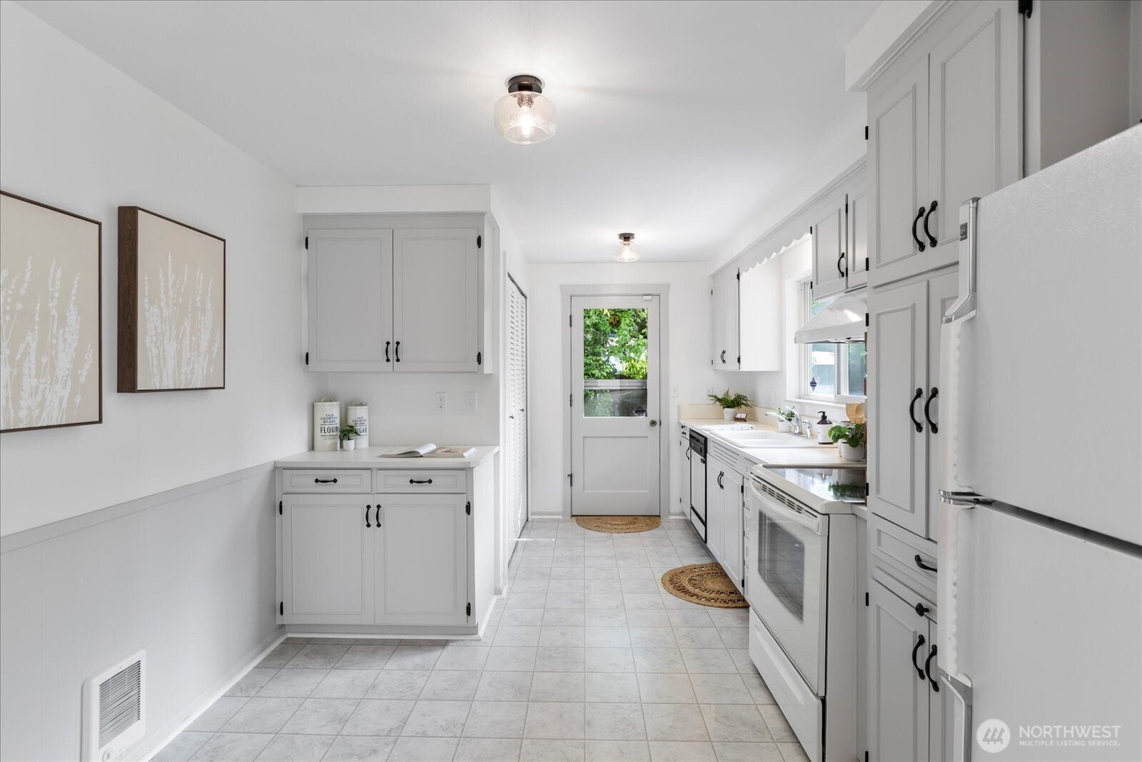 23908 80th Place West Edmonds, WA 98026 - Photo 7 of 40 a kitchen with cabinets and window