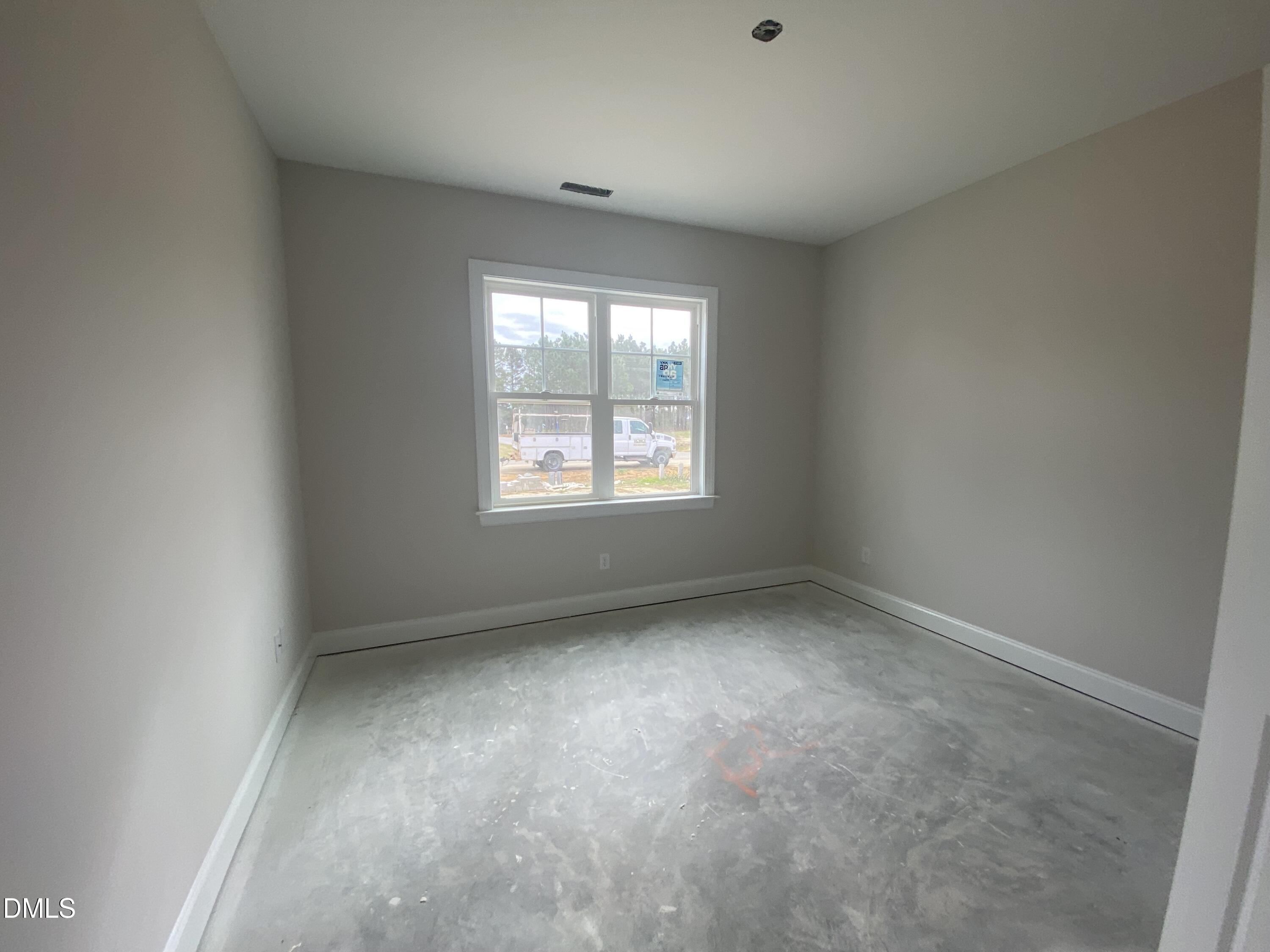 117 Rabbit Run Drive Smithfield, NC 27577 - Photo 12 of 16 an empty room with a window