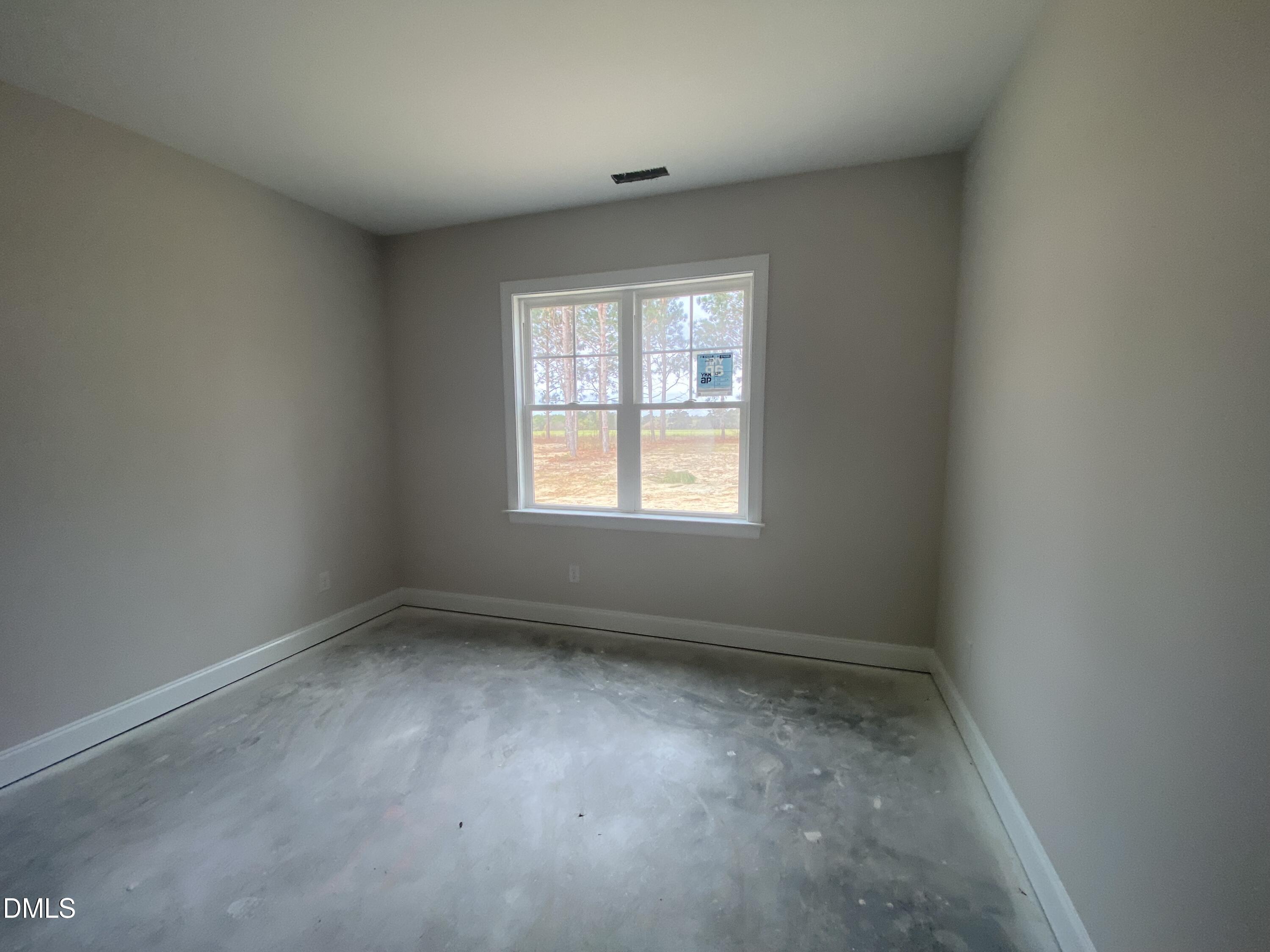 117 Rabbit Run Drive Smithfield, NC 27577 - Photo 14 of 16 an empty room with a window