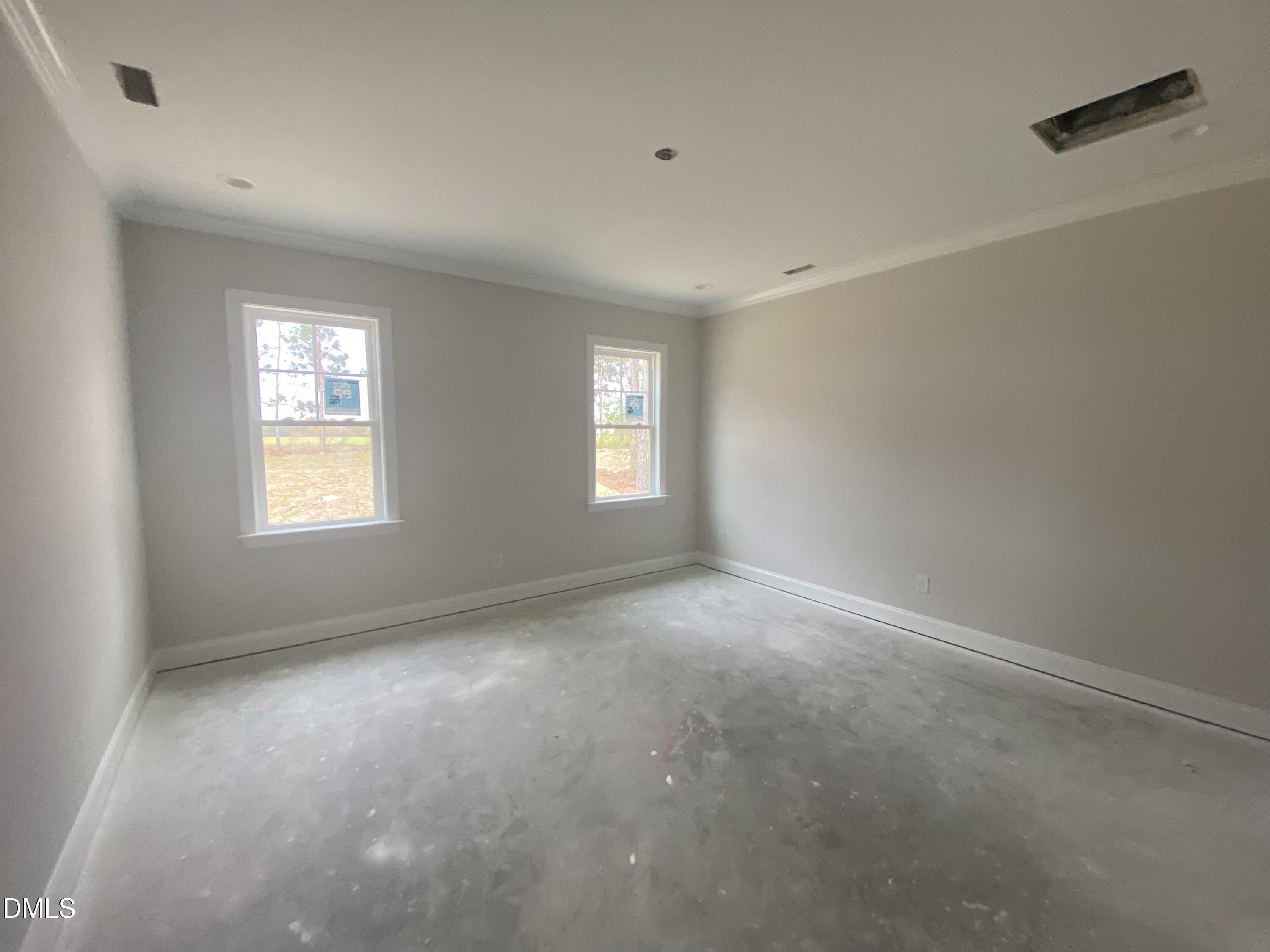 117 Rabbit Run Drive Smithfield, NC 27577 - Photo 7 of 16 an empty room with windows