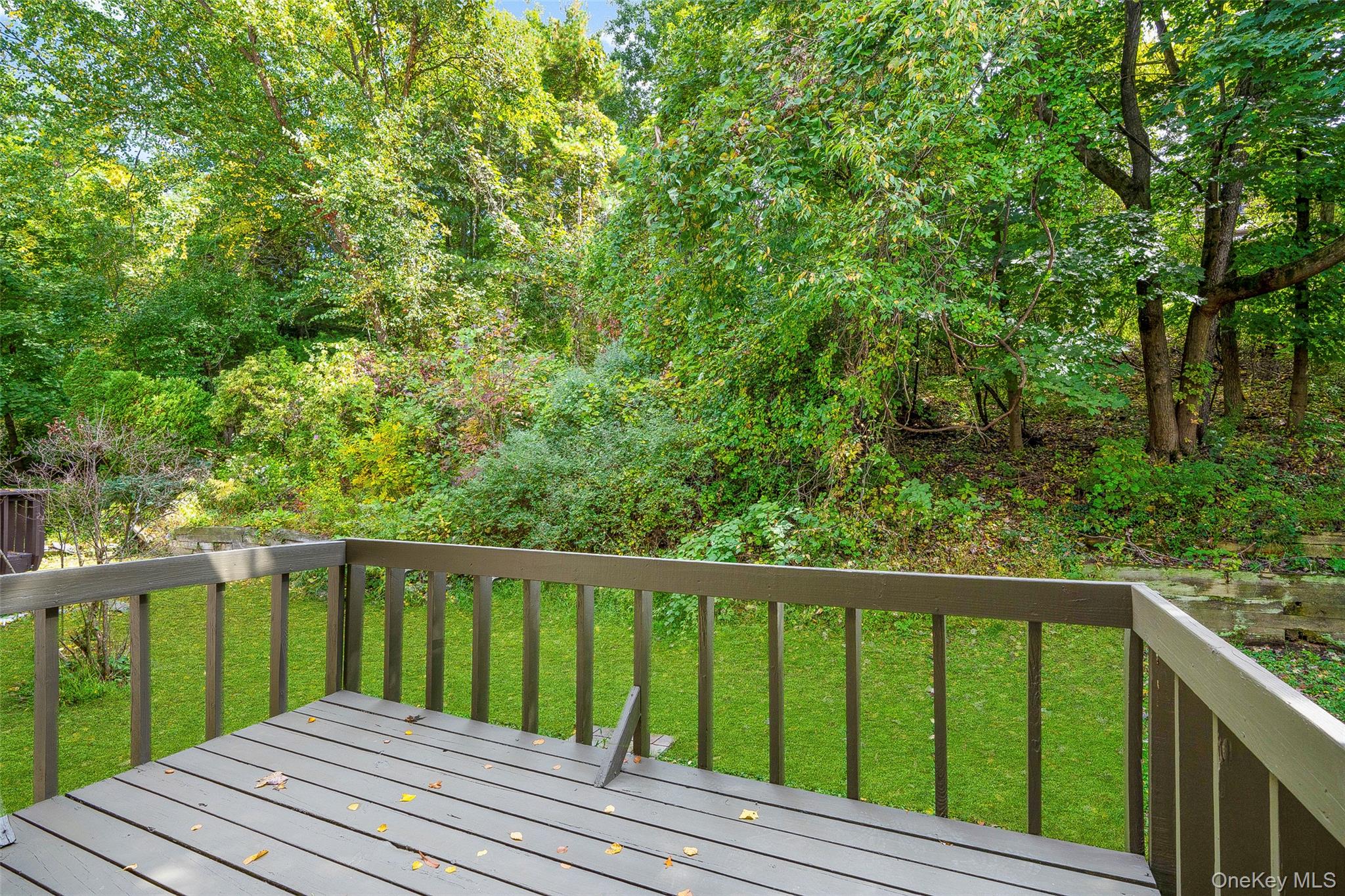 25 Laurel Court Fishkill, NY 12524 - Photo 17 of 26 a balcony with trees in front of it