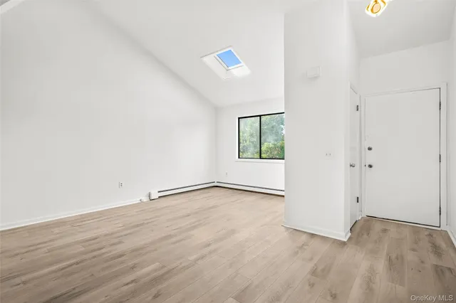 a balcony with trees in front of it