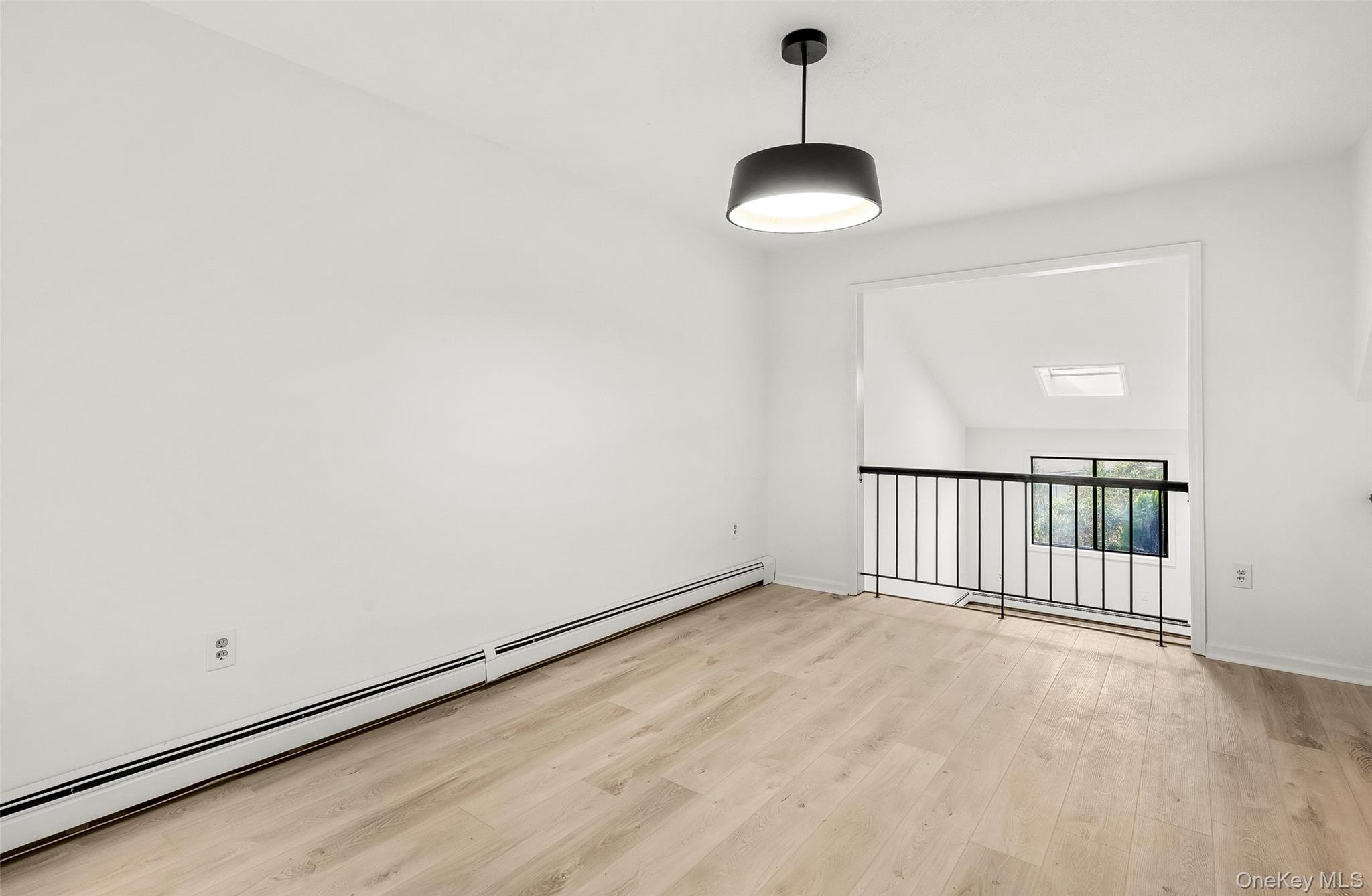 25 Laurel Court Fishkill, NY 12524 - Photo 21 of 26 a view of a room with stairs and a chandelier