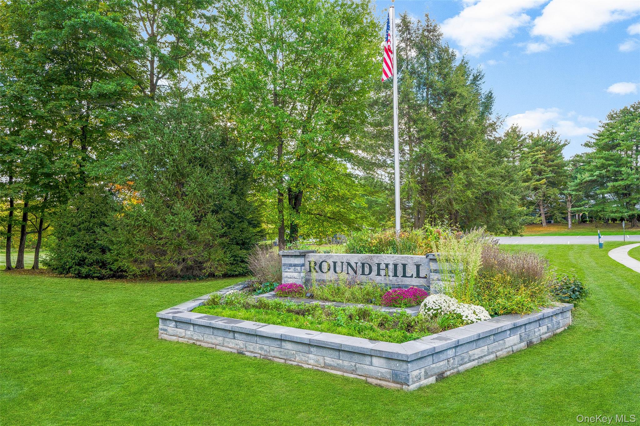 25 Laurel Court Fishkill, NY 12524 - Photo 24 of 26 a view of a garden with swimming pool and green space