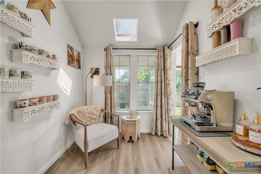 3905 Tyler Trail Temple, TX 76504 - Photo 25 of 31 a living room with furniture and a wooden floor