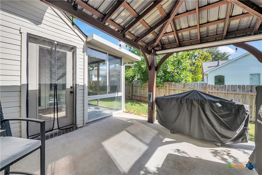 3905 Tyler Trail Temple, TX 76504 - Photo 30 of 31 a view of backyard with tub and wooden fence