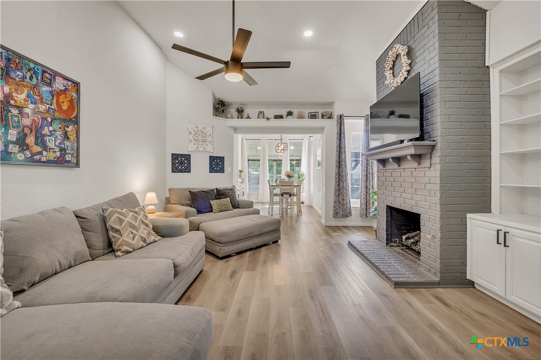 3905 Tyler Trail Temple, TX 76504 - Photo 4 of 31 a living room with furniture and a fireplace