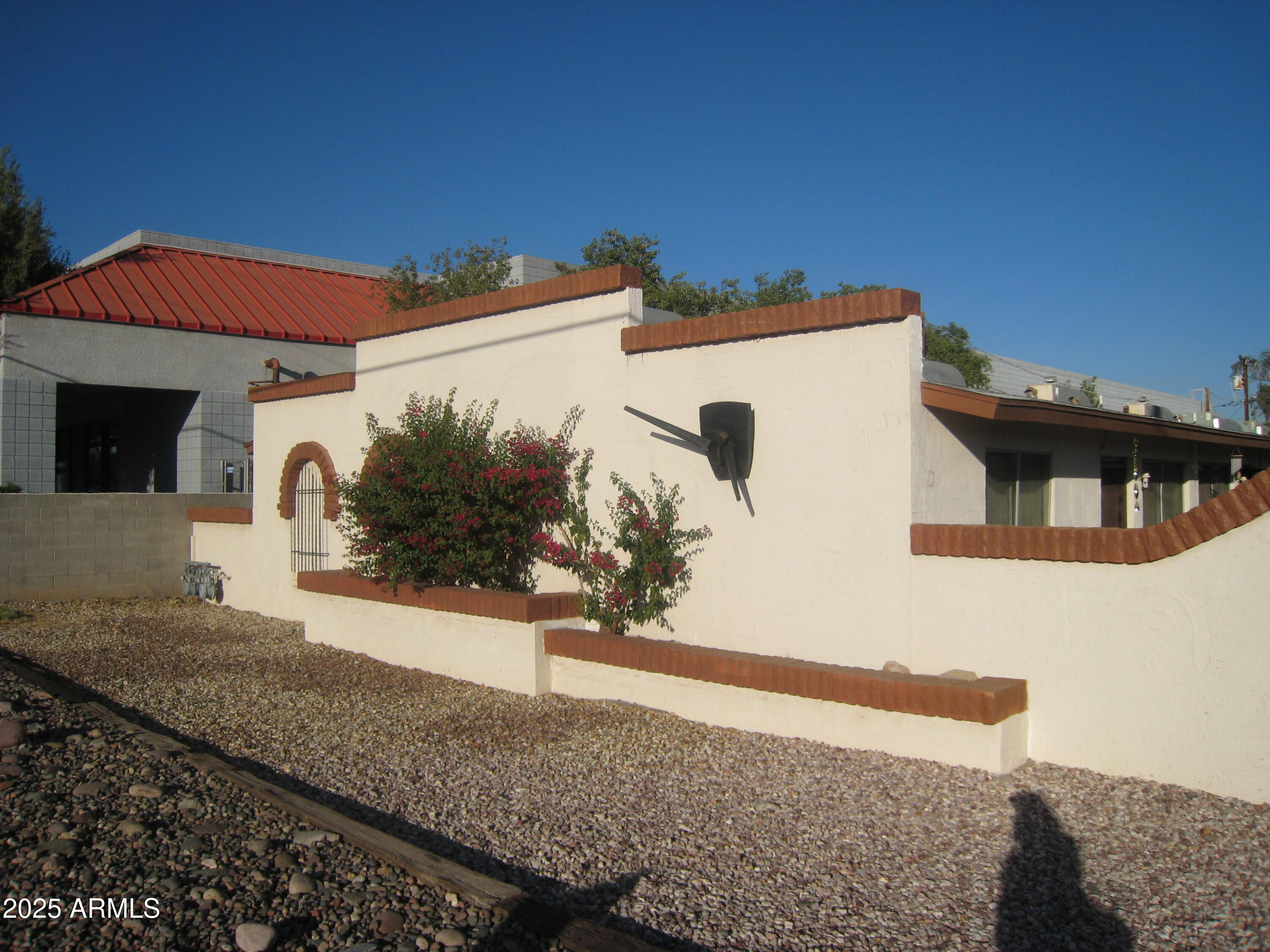 909 South Priest Drive, Unit 10 Tempe, AZ 85281 - Photo 12 of 14 a view of a house with a snow