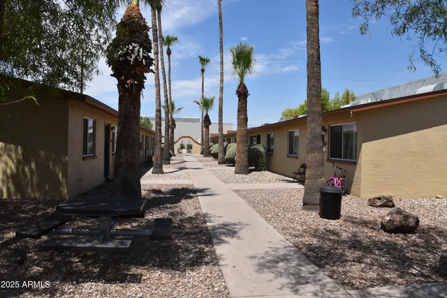 a view of a backyard of the house