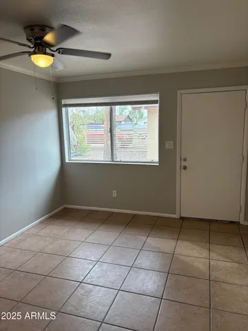 a view of an empty room and window