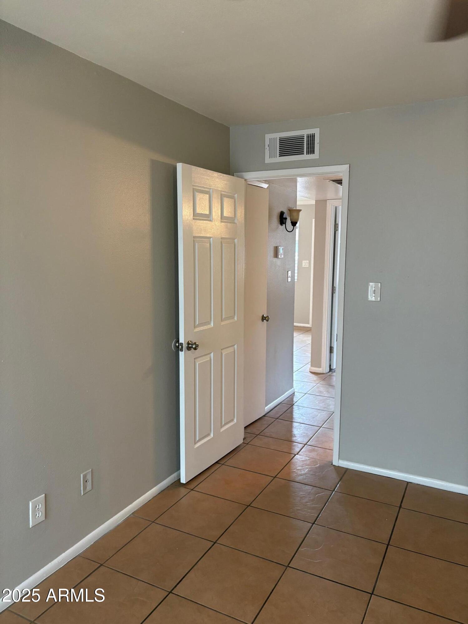 909 South Priest Drive, Unit 10 Tempe, AZ 85281 - Photo 6 of 14 a view of a utility room with a sink