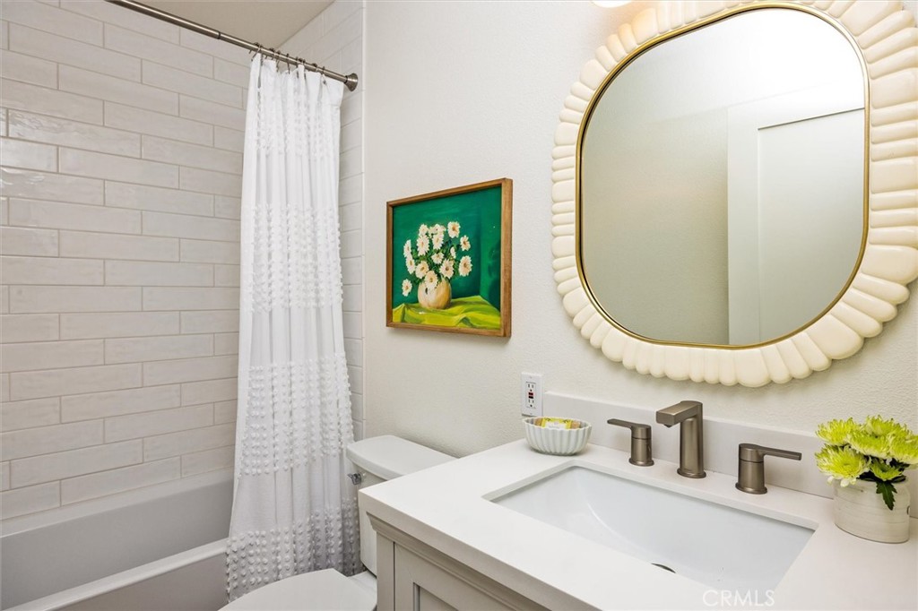 4255 San Benito Road Atascadero, CA 93422 - Photo 23 of 51 a bathroom with a sink and a mirror