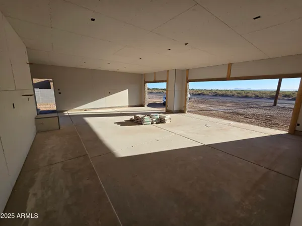 a view of a kitchen with a sink and a window