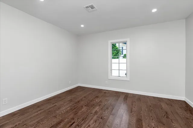 a bathroom with a shower and a sink