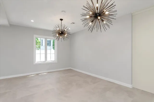 a open kitchen with stainless steel appliances granite countertop a sink stove and refrigerator