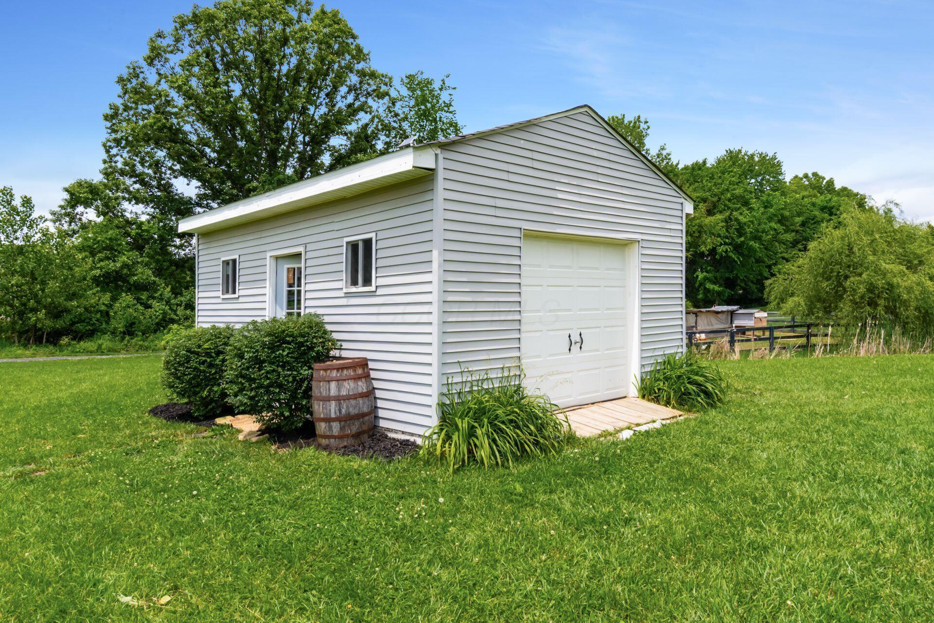 1820 Bean-Oller Road Delaware, OH 43015 - Photo 5 of 57 Shed with garage door