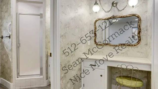 a bathroom with a mirror and shower curtain