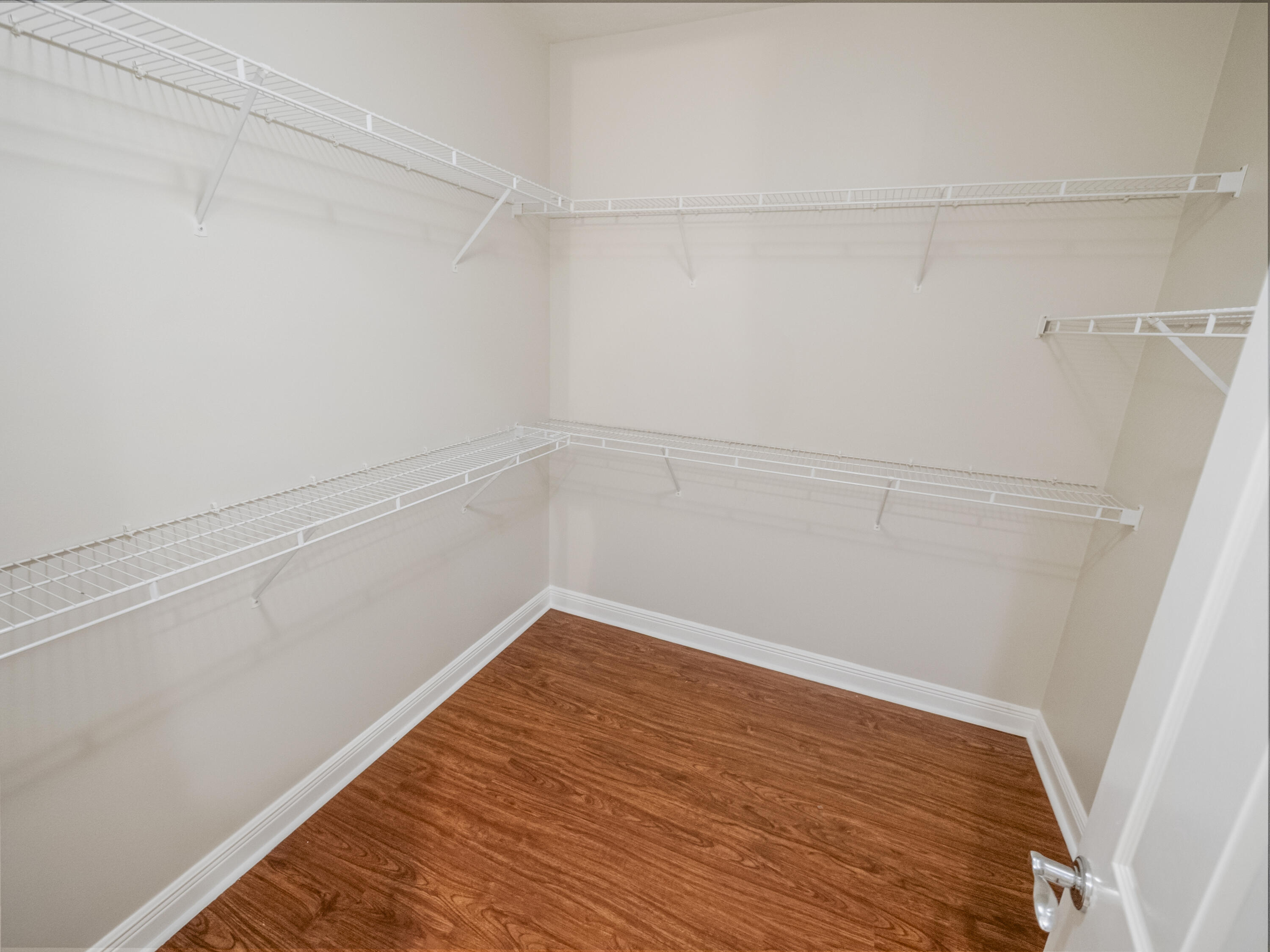 148 Morning Dew Circle Jupiter, FL 33458 - Photo 14 of 21 a view of a room with wooden floor